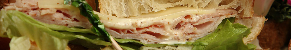 Eating Gluten-Free Sandwich at Brandywine Kitchen restaurant in Bellingham, WA.